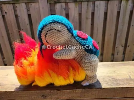 Cyndaquil hugging his fire
